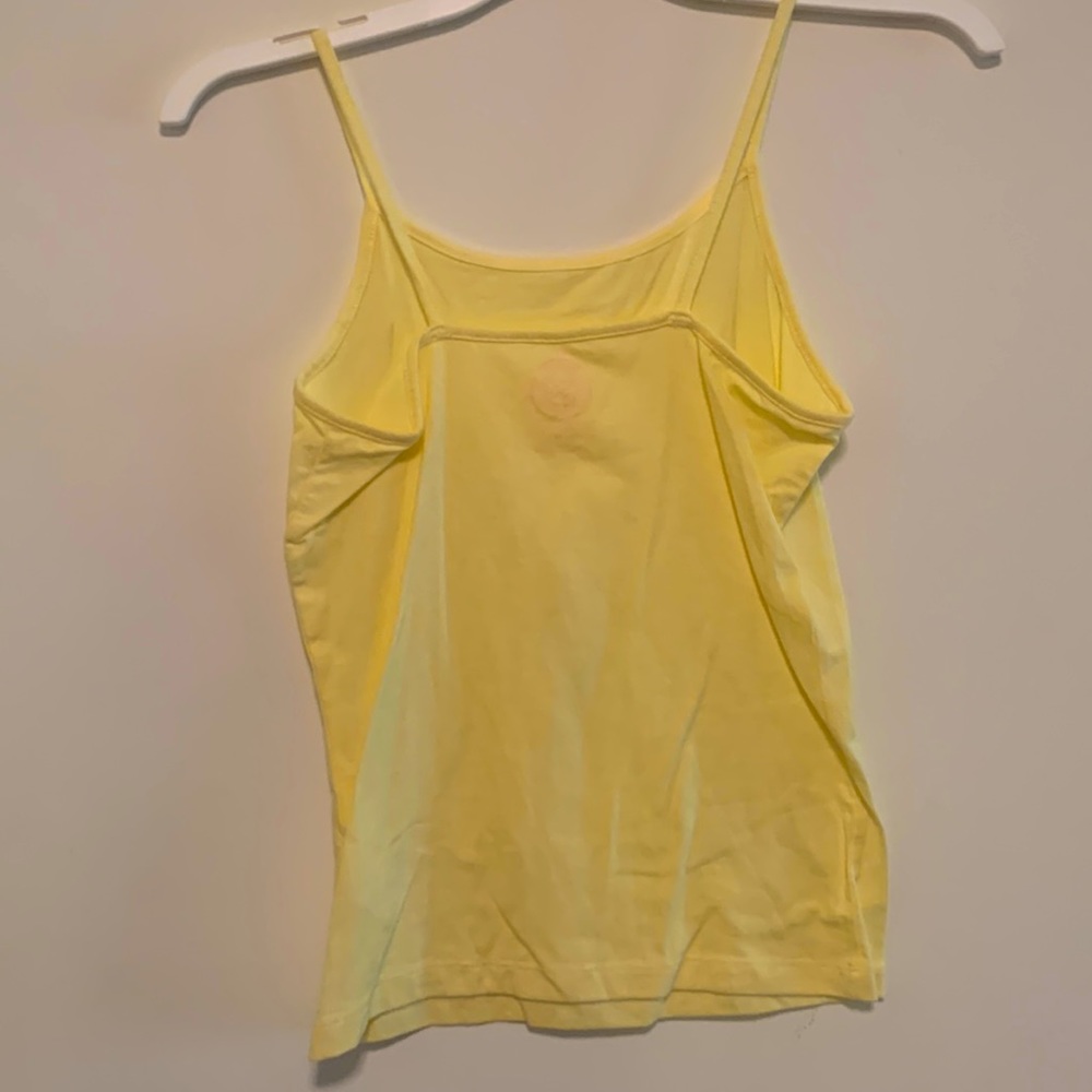 Yellow tank top.  Never worn